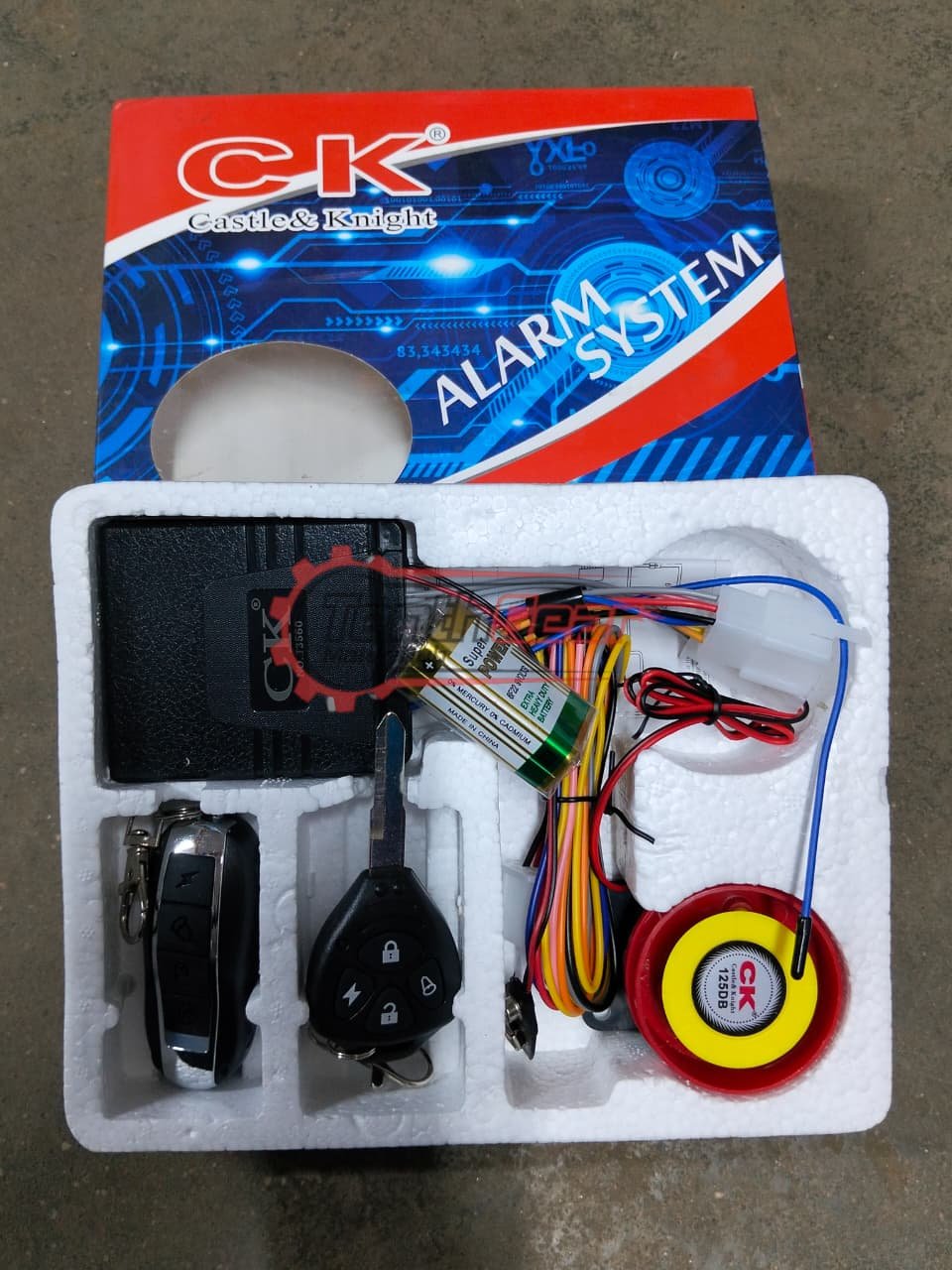 Motorcycle alarm with key